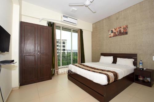 Service Apartments in Kopar Khairane, Mumbai | Bedroom